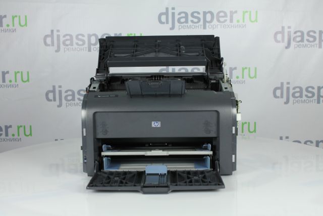 Снимите верхнюю крышку HP LaserJet 1010 